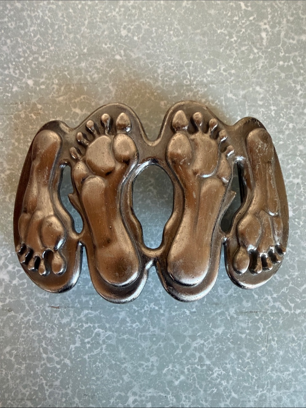 Naughty feet belt buckle